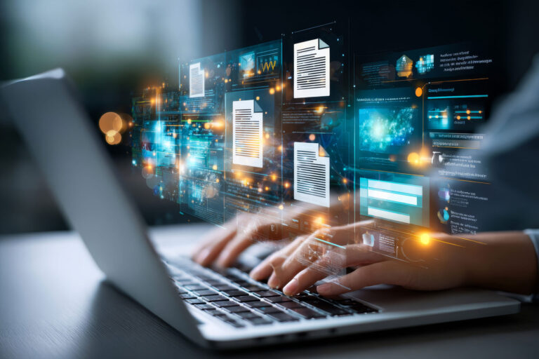 トレカショップのPOS選び、3年後も後悔しませんか? プロ仕様システムが選ばれ続ける本当の理由 5 ノートパソコンでデータ管理を行う様子と、デジタル化された資産を象徴するアイコンのイメージ。店舗運営におけるデータ活用の重要性を表現している。